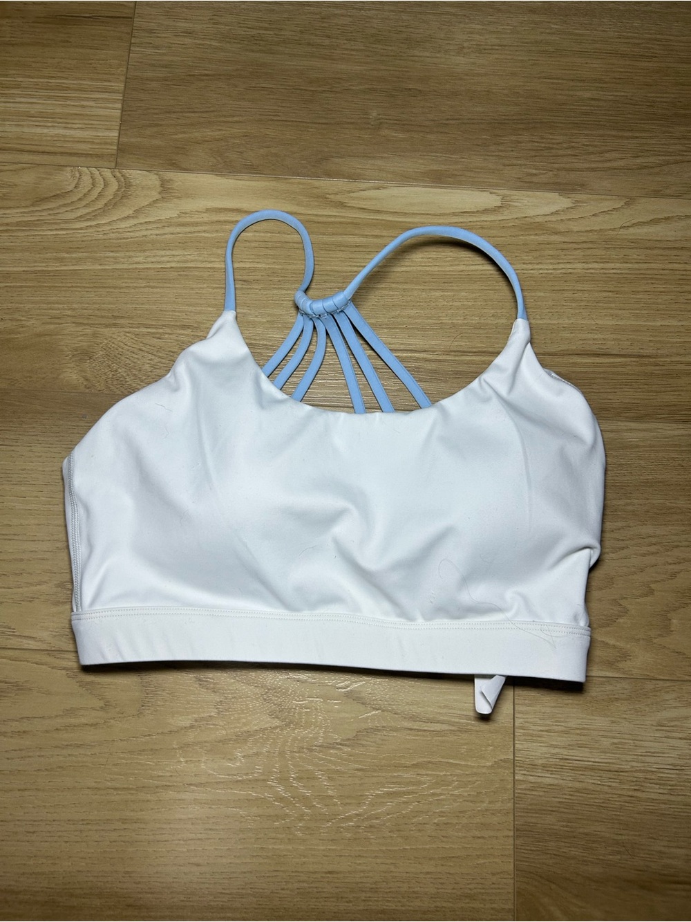 Women's White Sports Bra with Light Blue Strappy Back